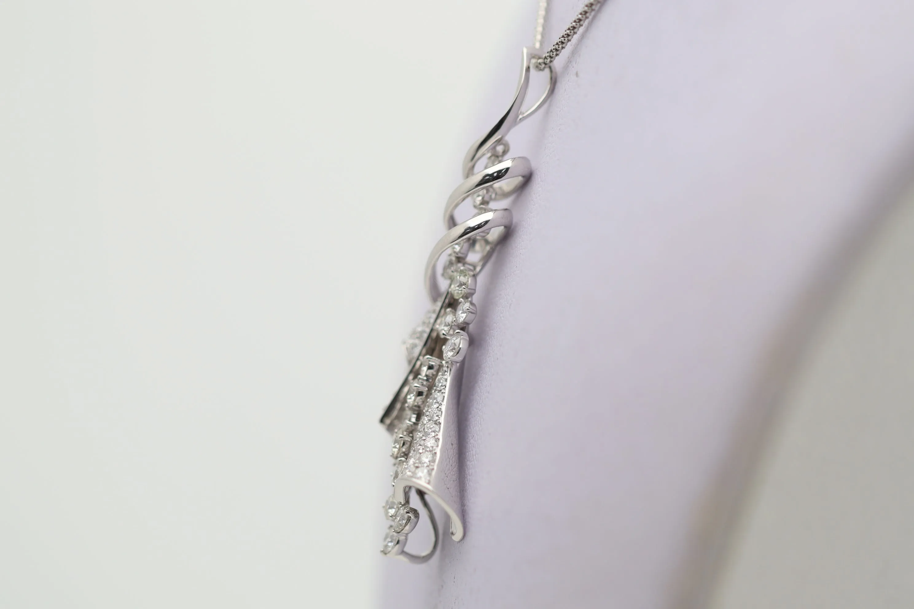 Diamond Cascade Gold Swirl Pendant