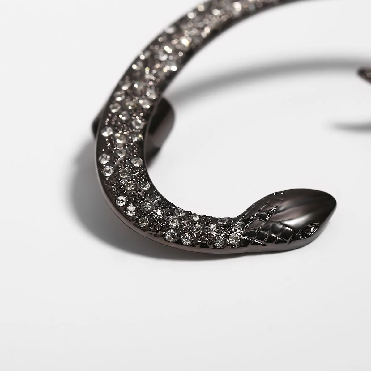 Exaggerated Snake and Dragon Earrings with Zircon Details